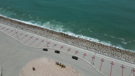 Drone-shot-of-the-great-wall-of-Lagos-and-Eko-Atlantic-City-viewpoint-looking-into-the-Atlantic-ocean