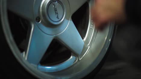 Wiping-alloy-azev-radial-wheel-in-slow-motion-closeup