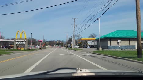 Point-Of-View--Driving-Through-Typical-Small-Town-In-America