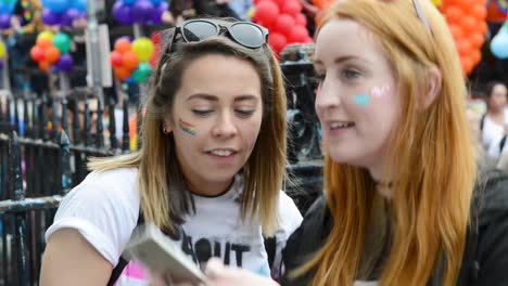 Taking-selfies-at-Dublin-Pride-Ireland-Laughing-and-joking