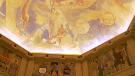 Visitors-Viewing-The-Famous-Foucault-Pendulum-Inside-Griffith-Observatory-In-Los-Angeles,-California