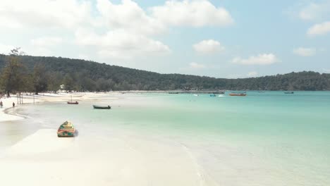 People-enjoy-the-tropical-sea-at-beach,-Koh-Rong-Samloem