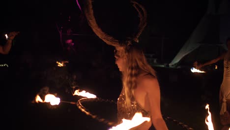 Woman-in-Costume-Performs-Live-Fire-Dance-Ritual-at-Celebrate-Life-Gathering