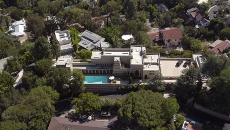 Aerial-of-Frank-Lloyd-Wright's-Ennis-House-entryway-with-pool