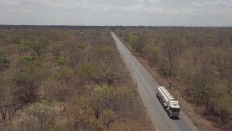 Aerial-tracks-traffic-on-Tanzanian-highway-near-Mikumi-National-Park