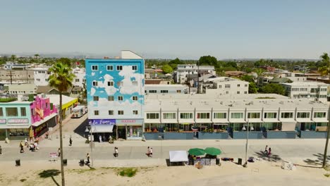 Drone-shot-flying-over-Venice-Beach-city-on-West-Coast-of-America