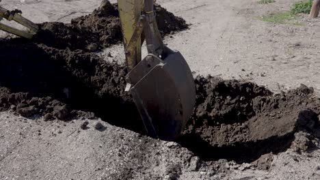 Tractor-Digging-Dirt-on-a-Ranch