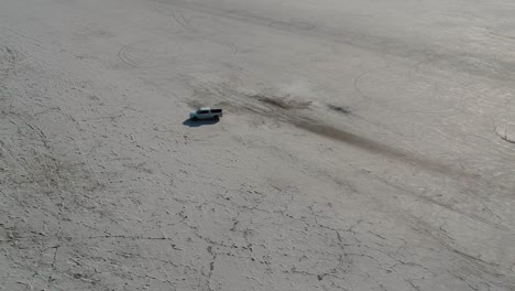 Slow-Zoom-White-Pickup-Truck-Sitting-Idle-Not-Moving-on-Bonneville-Salt-Flats