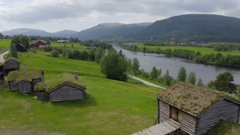 Aerial-view-over-traditional-Norwegian-Houses-has-green-roofes-in-tynset-town-in-Norway-on-June-25,-2021