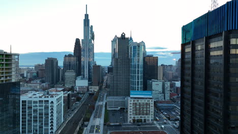 Aerial-truck-shot-of-skyscraper-with-digital-ticker-sign