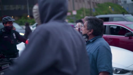 An-angry-man-shouts-at-police-during-a-BLM-protest-in-Downtown