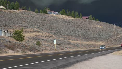 Vehicles-evacuate-Grand-Lake-CO-wild-fire-with-ominous-smokey-dark-sky