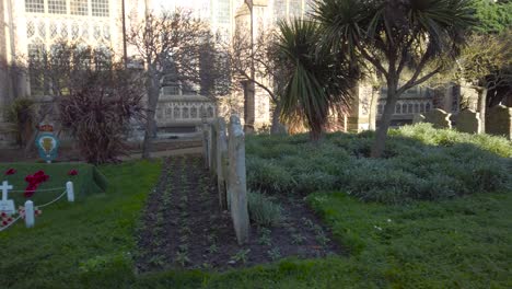 Moving-left-to-right-along-graves-in-the-England-Cemetery,-Cromer-England-North-Sea-Church