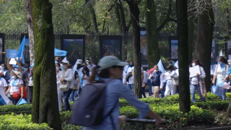 Protest-riot-in-Mexico-City-CDMX,-crowd-of-people-with-flags-and-posters