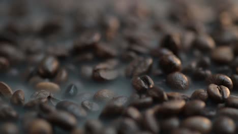 Macro-zoom-in-to-a-steaming-coffee-beans