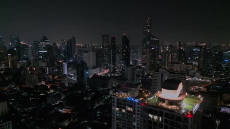 Bangkok-City-Downtown-At-Night-In-Thailand---Aerial-Pullback