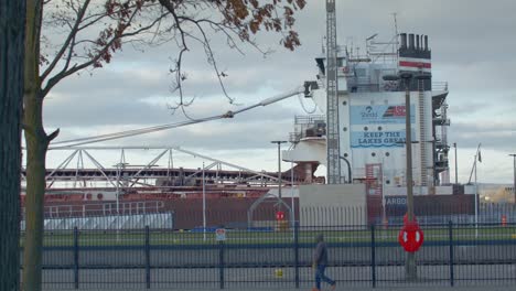 Large-cargo-ship-moving-forward-in-the-Soo-Locks,-located-in-Sault-Ste