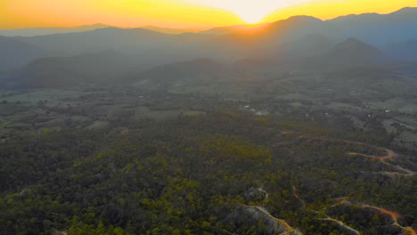 Scenic-sunset-aerial-over-the-mountains-and-countryside-of-Thailand