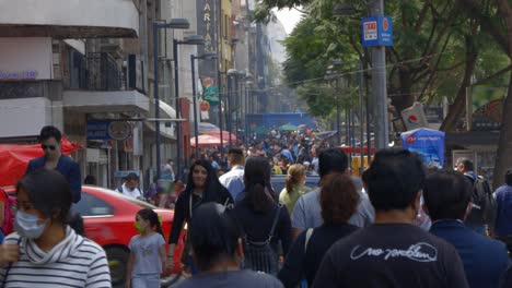 Crowd-of-ethnic-Mexican-people-walking-on-the-street-of-Mexico-City-CDMX