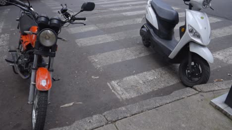 Scooters-parked-near-intersection-main-road-of-Mexico-City-CDMX-day-time