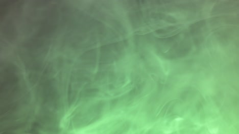 Abstract-movement-of-green-smoke,-steam-with-light-falling-on-it