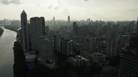 Haizhu-District-and-Qian-River-with-City-Skyline-at-Dusk-in-Drone-Footage