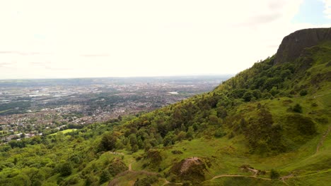 Aerial-shot-of-Cavehill-in-North-Belfast,-NI-on-a-sunny-day