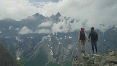 Hikers-enjoy-breathtaking-views-of-Norway's-Trollveggen-from-Litlefjellet-hike