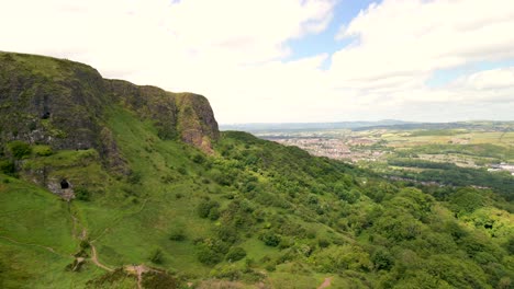 Aerial-shot-of-Cavehill-in-North-Belfast,-NI-on-a-sunny-day