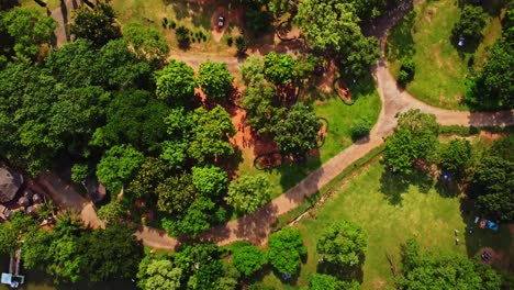 Top-down-aerial-of-a-beautiful-park-on-a-sunny-day-in-Abuja,-Nigeria