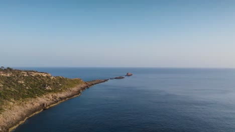 Aerial-View-Of-Punta-De-El-Toro-Rock-Formation-Stretch-Into-Sea,-Mallorca