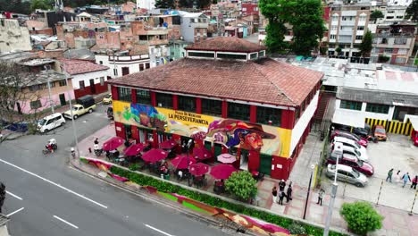 view-of-the-front-of-Plaza-de-Mercado-La-Perseverancia-in-Bogotá,-mural-and-mosaic-art-painted-by-a-group-of-artists-in-2017