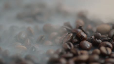 Macro-of-a-smoke-rises-above-the-coffee-bean