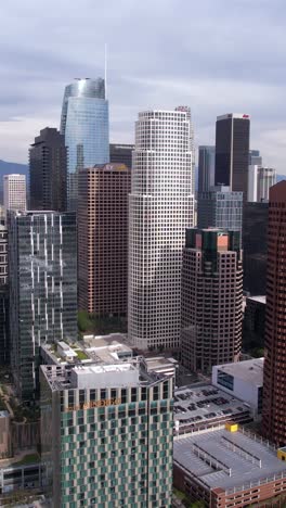 Vertical-Drone-Shot,-Downtown-Los-Angeles-Skyscrapers-and-Towers,-California-USA