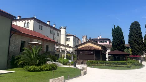 Historic-Buildings-with-noble-backyard-in-italian-city-during-summer-day