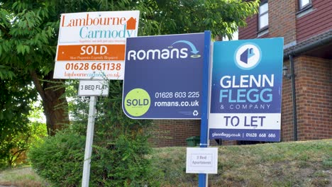 Three-estate-agent-signs-in-Slough-United-Kingdom-June-2024