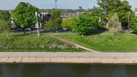 Promenade-at-waterfront-of-american-town-during-sunny-day