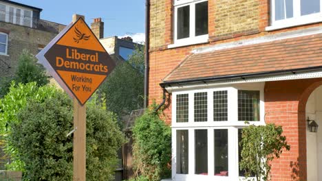 Vote-Liberal-Democrats-sign-outside-of-end-of-terrace-house-in-Ealing-London-United-Kingdom-June-2024