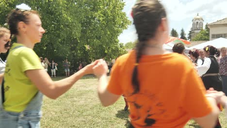 Bulgarian-crowd-perform-traditional-dance-Petrovden-summer-festival