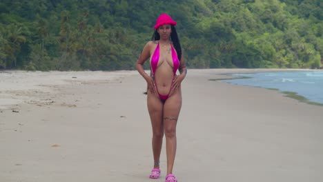 A-girl-in-a-thong-bikini-revels-in-a-sunny-day-on-a-Caribbean-beach-in-Trinidad