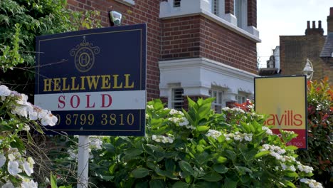 Beautiful-home-in-Ealing-with-two-agent-sale-signs-outside-London-United-Kingdom-June-2024