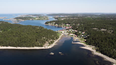 Aerial-view-of-Saltö-island-in-Sweden-with-lush-forests-and-clear-blue-waters