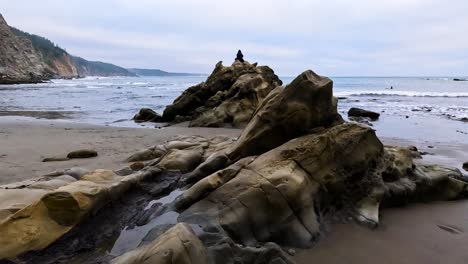 Giant-coral-rock-sits-on-the-coast-of-the-ocean