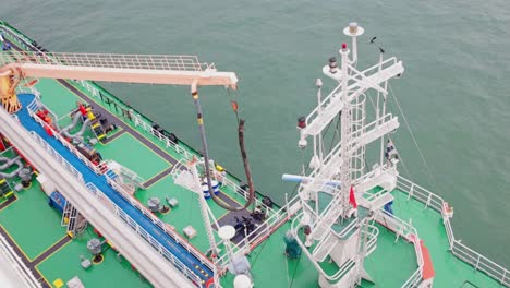 Top-View-Of-Small-Fuel-Tanker-Loading-A-Cruise-Ship-With-Fuel