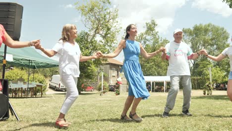 Crowd-people-dance-traditional-horo-at-Bulgarian-folk-festival