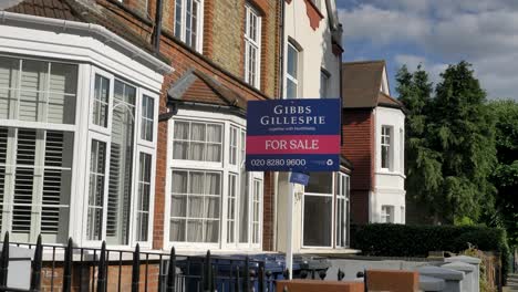 Exterior-of-house-in-Ealing-with-Estate-agent-for-sale-sign-London-United-Kingdom-June-2024