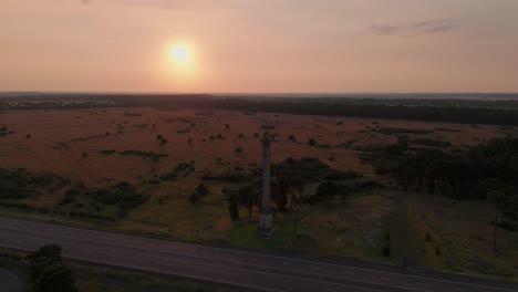 Panorama-Of-Elveden-War-Memorial-With-Rural-Nature-Background-At-Sunset-In-Suffolk,-Eastern-England