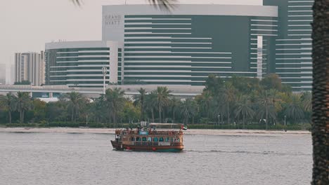 A-cruise-ship-carrying-tourists-on-Dubai-Creek-in-the-United-Arab-Emirates