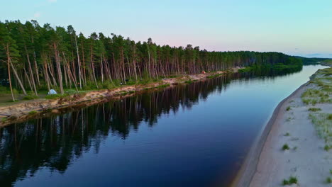 Aerial-of-people-camping-by-the-liman-side-of-the-Baltic-Sea-in-Latvia