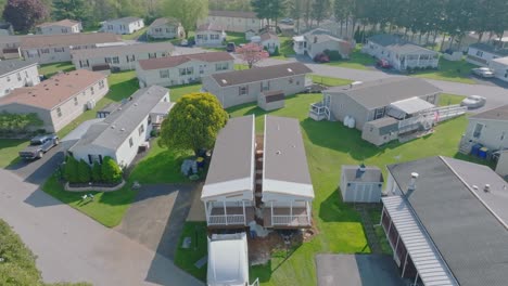 An-Aerial-View-of-a-Manufactured,-Mobile,-Prefab-Double-Wide-Home-Being-Installed-in-a-Lot-in-a-Park